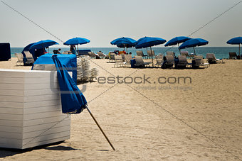 Sun umbrellas on a sandy beach