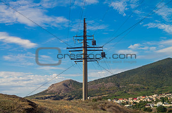 Power line pylon in the mountains.