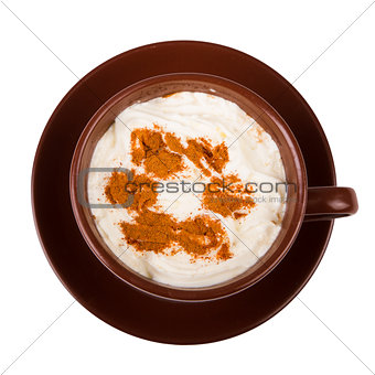 Coffee with whipped cream and cinnamon