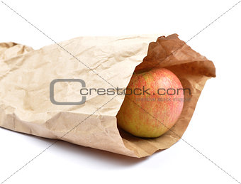 Apple in paper bag