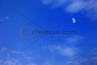 Evening blue sky with moon