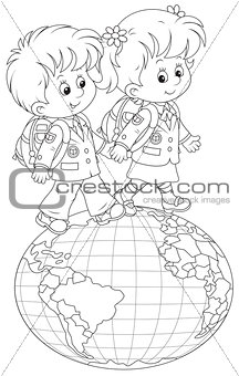 Schoolchildren going on a globe