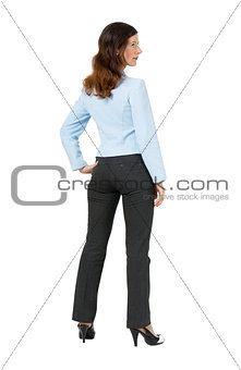 woman standing with his back on a white background