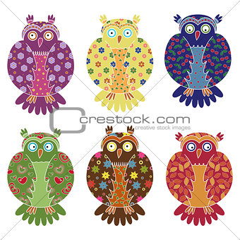 Set of six colourful funny owls over white