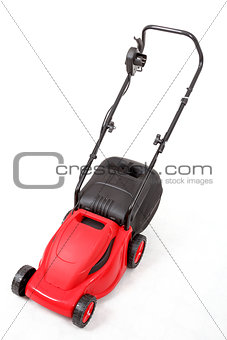 new red lawnmower on white background