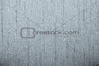 corrugated texture of silvery color with stamping