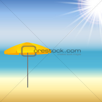 Beach with parasol and sun