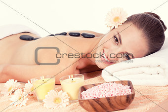 attractive helathy caucasian woman hot stone massage wellness 