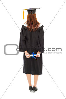 back of  full length beautiful young graduation woman standing 