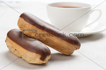 vanilla eclairs with chocolate frosting