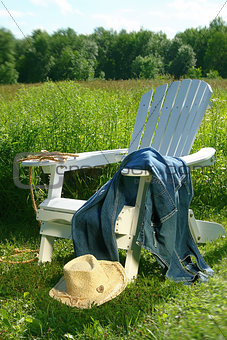 Jeans laying on chair 