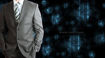 Businessman in a suit. Blue glowing figures