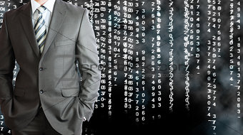 Businessman in a suit. White glowing figures