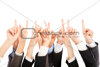group of business people hands point upward together