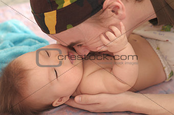 Father and daughter newborn playing