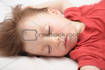 White caucasian European kid sleeping 3 years old