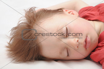 European kid sleeping 3 years old portrait