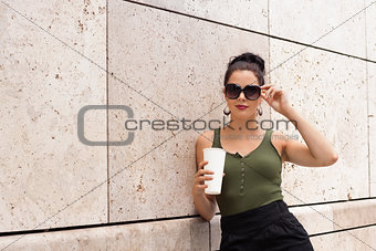 attractive young woman with  sunglasses outdoor