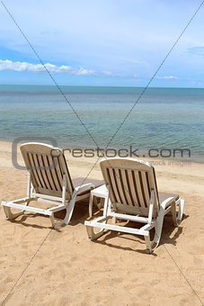 beach chairs on the sea 
