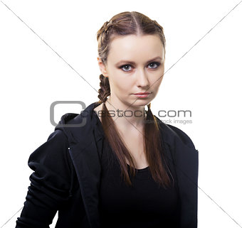 Portrait of a serious young woman on a white background