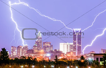 thunderstorm lightning strikes over charlotte city skyline in no