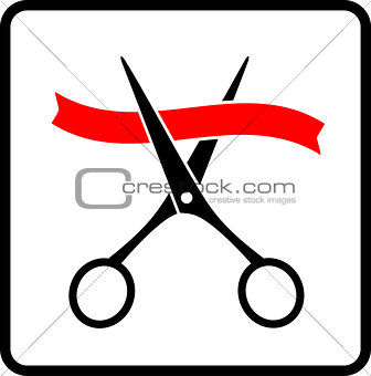 red ribbon and cutting scissors