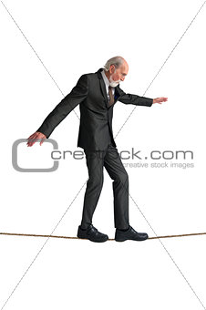 senior man walking a tightrope
