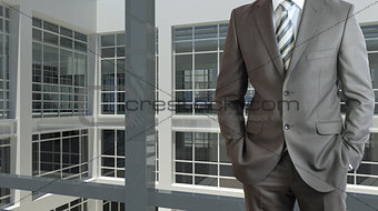 Businessman and large window airport terminal