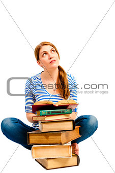 Russian student sitting with pile of literature
