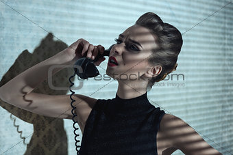 fashion girl with retro phone 
