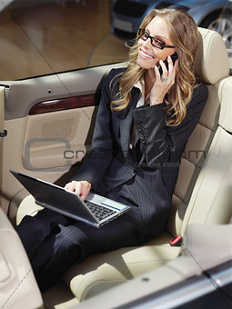 busy businesswoman with laptop l