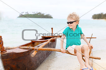 kid at outrigger canoe