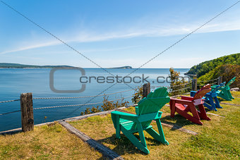 Colorful lounge chairs with a view of beautiful scenic panorama
