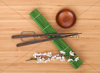 Chopsticks and sakura branch