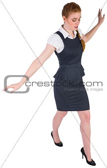 Businesswoman doing a balancing act