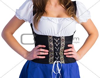 Oktoberfest girl standing with hands on hips