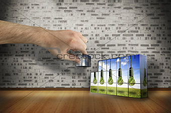 Composite image of hand building wall