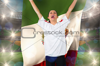 Composite image of football fan in white cheering holding mexico flag