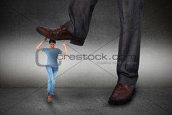 Composite image of businessman stepping on girl
