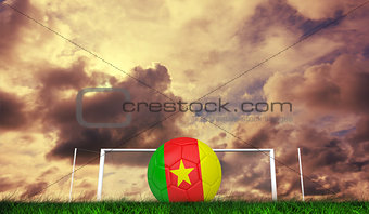 Composite image of football in cameroon colours