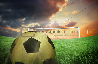 Composite image of gold football