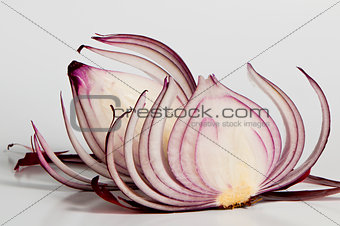 Two slices of red onion