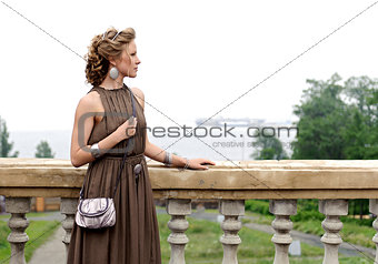 Beautiful girl on the balcony