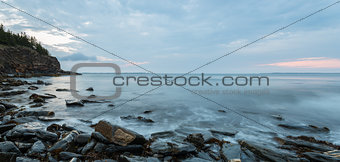 Panorama of ocean shore in the morning (Slow shutter speed)