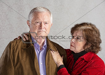 Concerned Senior Couple