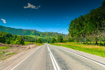 smooth automobile route passing in mountainous terrain