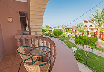 Chairs and table on hotel balcony