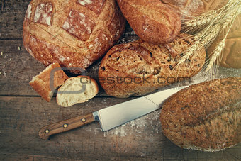 Assortment of breads on wood