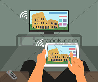 Multiscreen interaction. Man participates in TV show using smartphone and tablet pc.