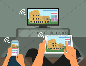 Multiscreen interaction. Man and woman are participating in TV show using smartphone and tablet pc.